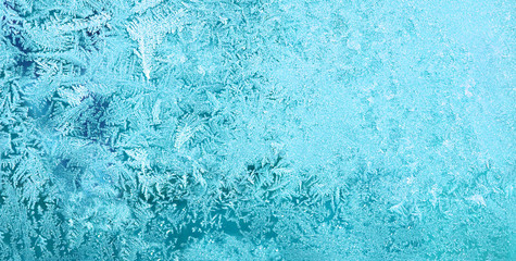 Fototapeta na wymiar Frost on glass in window winter. pattern snow and ice