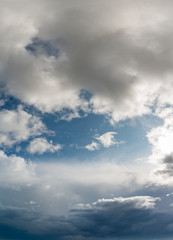 Fototapeta na wymiar Fantastic soft clouds against blue sky, natural composition - panorama