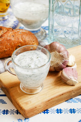 Greek Tzatziki yogurt sauce in a small sauceboat.