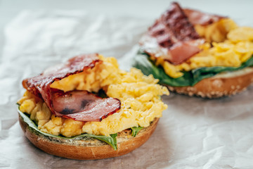 Breakfast Bagel With Scrambled Eggs, Spinach And Bacon