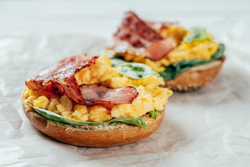 Breakfast Bagel With Scrambled Eggs, Spinach And Bacon