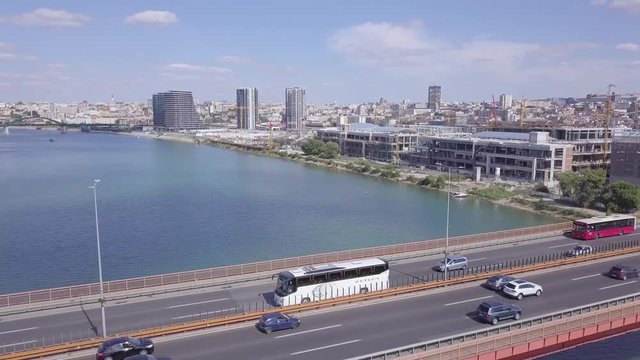 Slow cinematic establishing aerial shot of Gazela bridge and waterfront in Belgrade