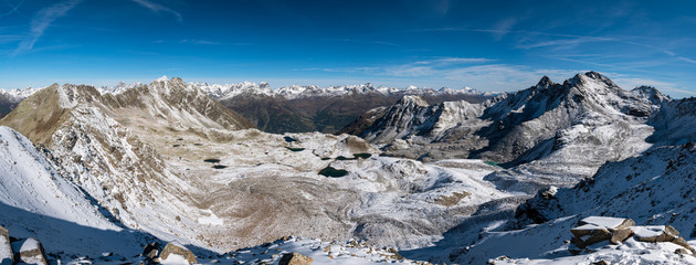 Panoramic Image of Lais da Macun in the first snow in fall
