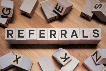 Referrals Word In Wooden Cube