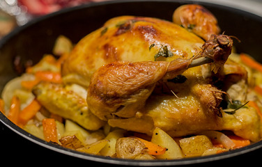 Roasted chicken with vegetable close up