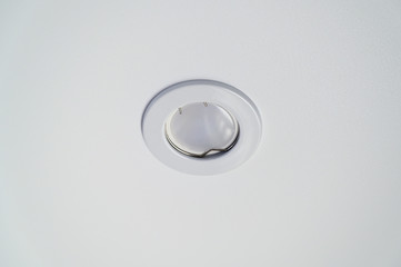 Photo of light bulbs, spotlights on the ceiling in the room. Industry, electrics.