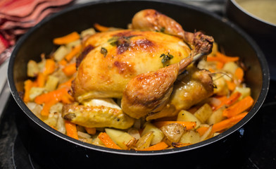 Roasted chicken with vegetable close up