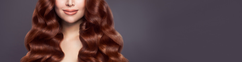 Beautiful woman hair. Long healthy brown curly hair on banner background