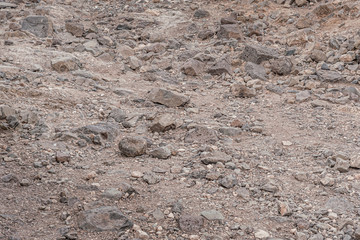 abstract background of pebbles on dry ground