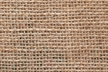 Fabric texture background of linen sacking cloth. Closeup of burlap fabric.