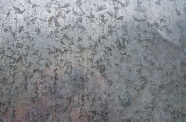 Texture of tin metal gray closeup.
