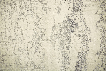 Cream grungy concrete wall texture. Stone surface pattern.