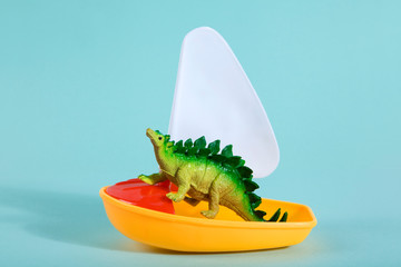 dinosaur on a boat
