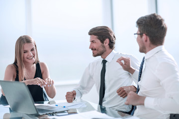 Fototapeta premium close up. happy employees showing their success