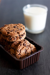 BREAKFAST OF COOKIES WITH CHOCOLATE CHIPS AND MILK GLASS