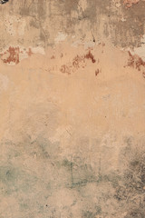 Cracked and peeling paint old wall background.