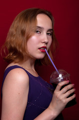 beautiful girl with French fries and drink