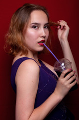 beautiful girl with French fries and drink