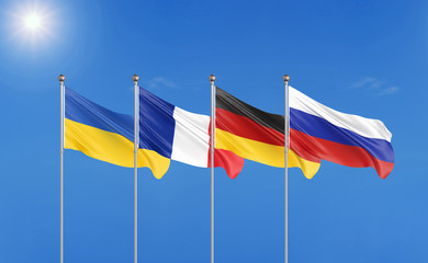 Flags of France, Germany, Russia, and Ukraine. Normandy Format meeting on eastern Ukraine. 3D illustration on sky background. – Illustration.