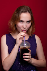 beautiful girl with French fries and drink