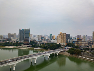 Fototapeta na wymiar Aerial photos of the river crossing bridge and high-rise buildings along the river in Chinese cities