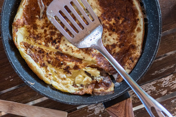 Isolated close up top view of a scrambled egg pan- Israel