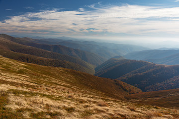 Charming autumn on mountain ranges in Ukrainian Carpathians with beautiful hiking landscapes