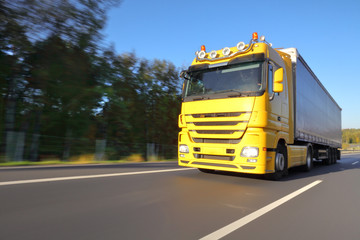 Fototapeta premium Truck transport on the road and cargo 
