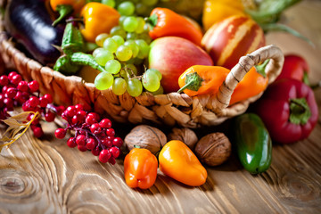 The table, decorated with vegetables and fruits. Harvest Festival. Happy Thanksgiving. Autumn background. Selective focus.