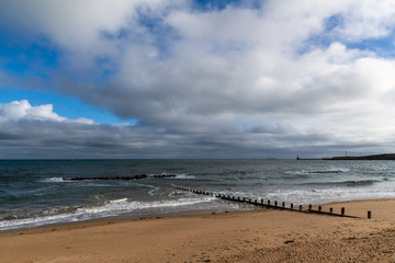 Fototapeta na wymiar Aberdeen Scotland, coastline on a beautiful windy autumn afternoon