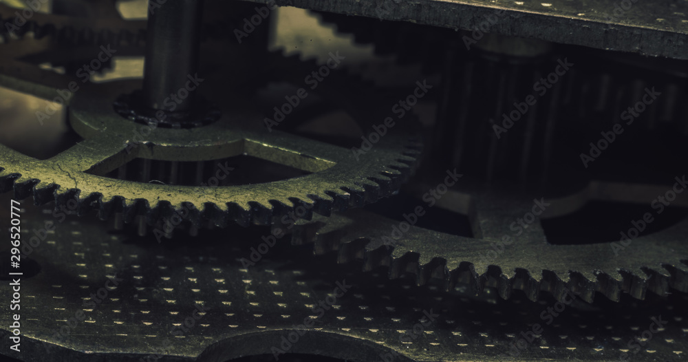 Poster close up beautiful old gears watch on a dark background. macro view.
