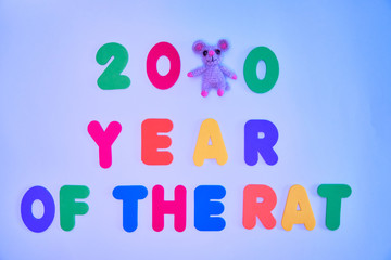 Text from collected multicolored letters on a light background instead of the number rat.  text 2020 rats