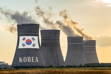 Nuclear plant chimneys displaying flag of Korea, Republic of with according text. Energy pollution...