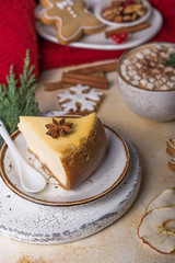 Slice of sweet cheese cake for Christmas Eve. Breakfast concept. Coffee time. Still life of food.