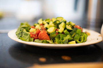 fresh cooking a salad and vegetables