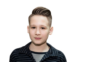 Stylish modern retro haircut side part with mid fade with parting of a schoolboy guy in a barbershop on an isolated white background