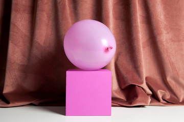 colourful velvet pink balloon cube podium