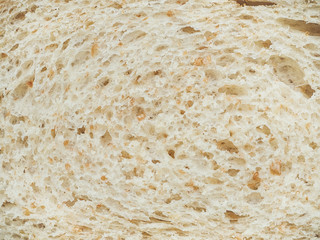 texture of slices of white bread with bran closeup