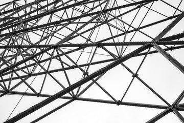 part of a large modern ferris wheel - black and white photo