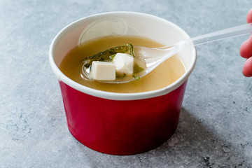 Take Away Asian Food Wonton Soup with Bok Choy and Chives in Plastic Bowl Package or Container Box.