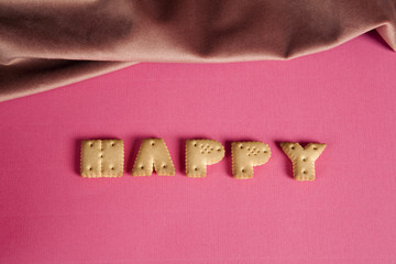 happy word dry biscuit pink