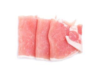 Raw pork meat with parsley herb leaves isolated on white background