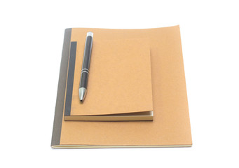 brown note book with black pen