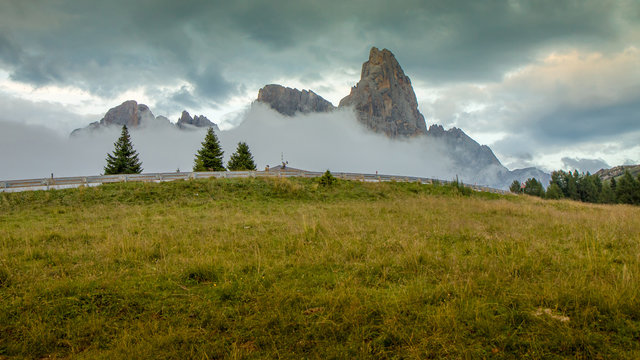 Beatifuil panoramic view of Italian Alps with dramatic light, Dolomites (Dolomiti), Italy, Europe. 4k wallpaper. HD background.
