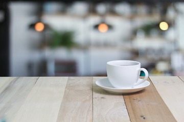Hot Coffee cup  on the wooden table