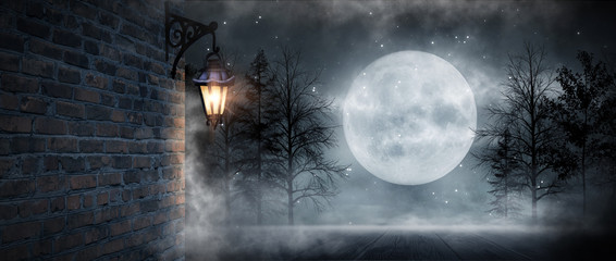 Dark street, a lantern on an old brick wall, a large moon, smoke, smog. Night scene of the old city, dark forest.