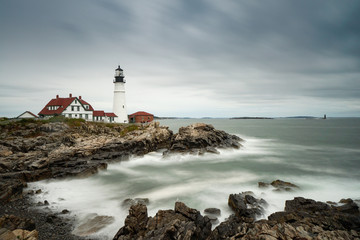Fototapeta na wymiar Portland Headlight on the coast of Maine on a stormy and overcast day