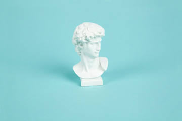 bust of David on a turquoise background