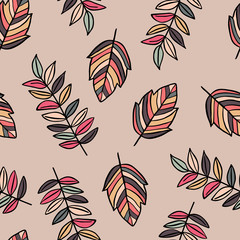 Autumn leaves with color stripes, abstract colors on beige background. Vector seamless pattern.
