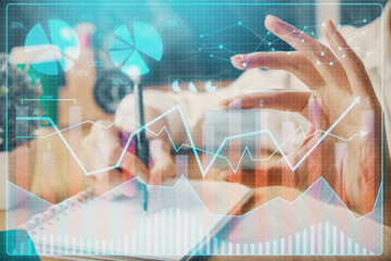 Forex chart displayed on woman's hand taking notes background. Concept of research. Multi exposure